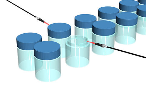 Detecting the presence of caps of vial bottles